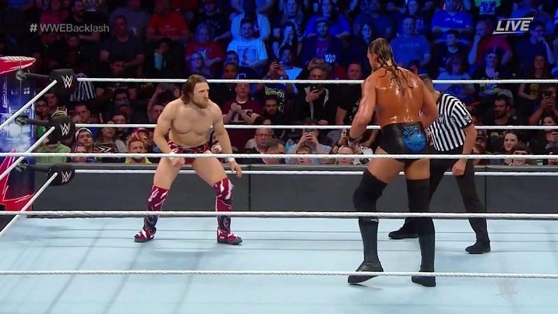 Daniel Bryan and Big Cass face off