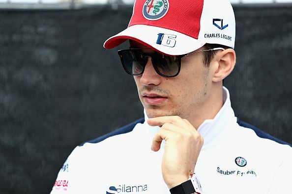 Anyone know what suit is Leclerc wearing here? : r/CharlesLeclerc