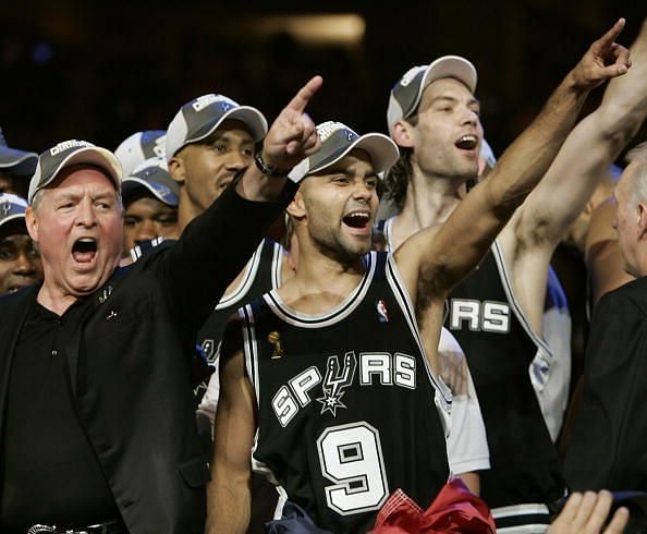 Tony Parker (C) of the San Antonio Spurs...