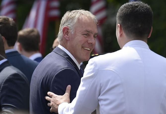 Watchdog clears Interior chief Zinke in speech to NHL team