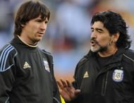 Argentina's coach Diego Maradona (R) spe