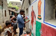 Artist paints a wall with picture of Portuguese footballer...