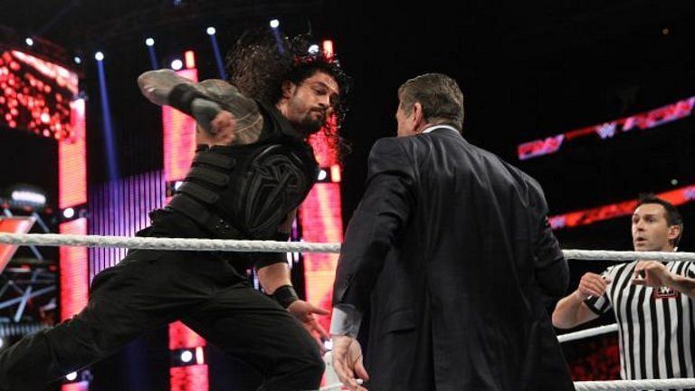 Image result for wwe roman hits vince