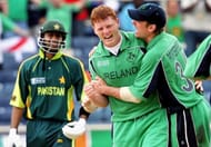 Pakistani batsman Shoaib Malik (L) looks...