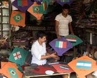 Kite maker prepares Kites with pictures of FIFA World Cup...