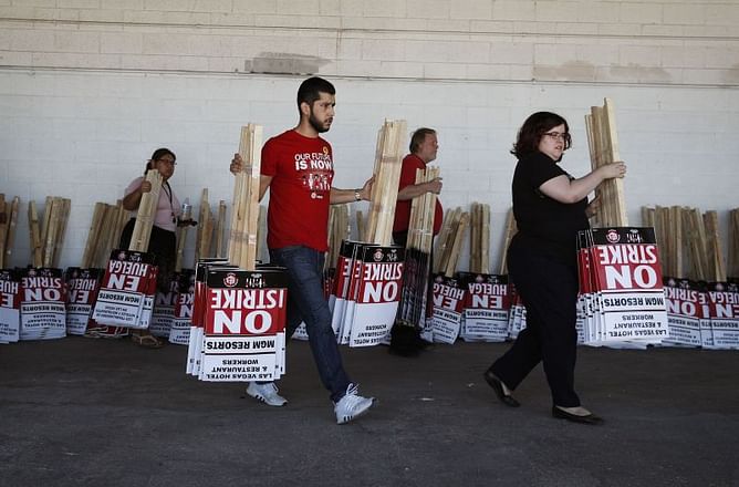 The Latest: Vegas union not detailing deal with Caesars yet