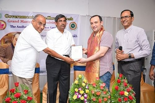 Enter captiAmonatov Farrukh being felicitated by  (L), Special Chief Secretary to AP government LV Subrahmanyam and APCA Presdient YD Rama Rao (R) of Sports Authority of Andhra Pradesh, Sri N Bangara Raju garuon