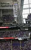 1 of 2 charged in stadium banner protest pleads guilty