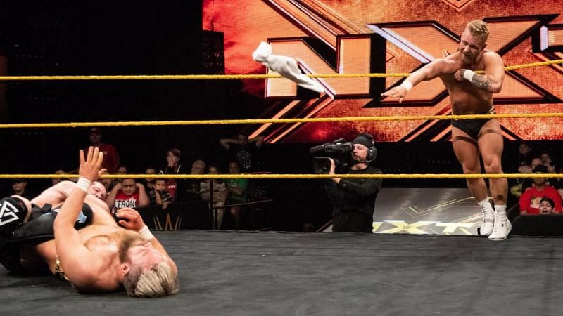 Tyler Bate throwing the towel for Moustache Moutain 