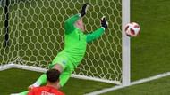 Jordan Pickford tips a Sweden effort around the post.