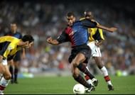 Rivaldo of Barcelona Patrick Rieira and Martin Keown of Arsenal