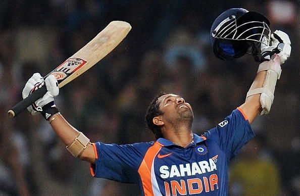 Indian cricketer Sachin Tendulkar throws