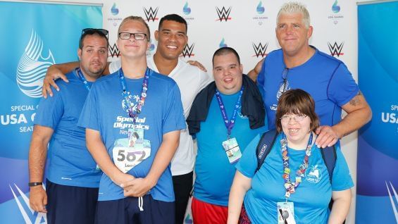 Jason Jordan and Goldust took photos with fans