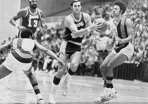 Jerry West (#44) and Wilt Chamberlain (#13)