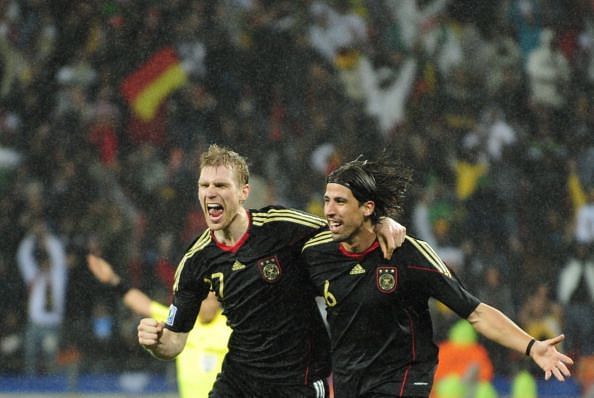 Germany&#039;s midfielder Sami Khedira (R) an