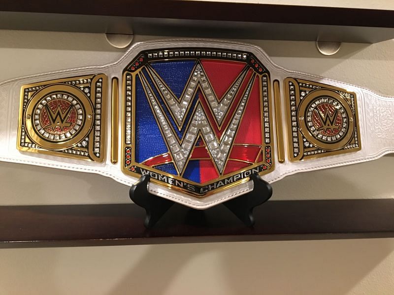 Image result for wwe raw womens title and smackdown women title