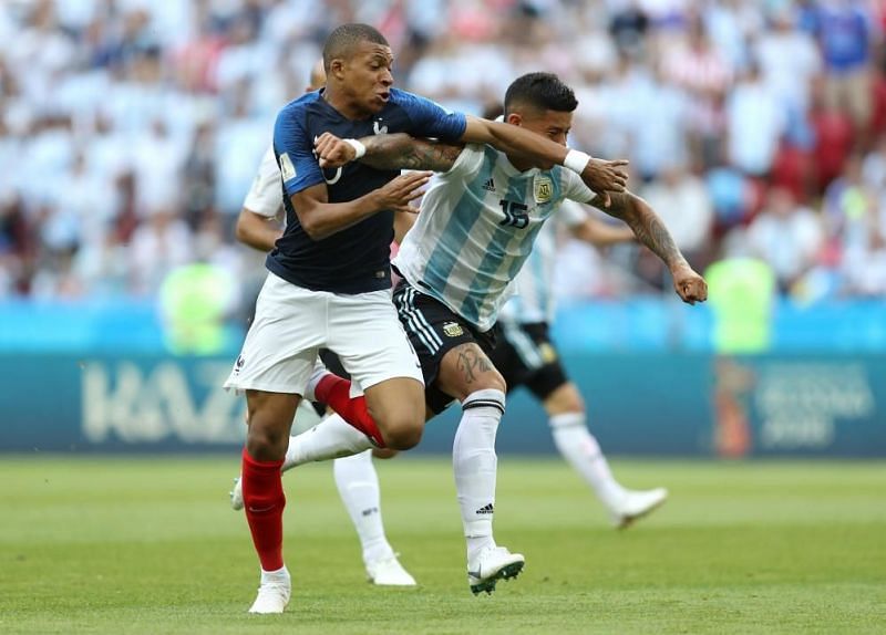 Rojo fouls Mbappe inside the box