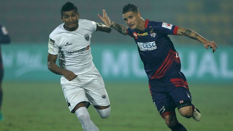 Nirmal Chhetri (left) vying for the ball in a match against ATK