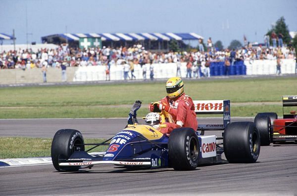 Mansell gives a lift to Senna