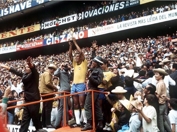 World Cup Final 1970 Mexico City, Mexico. 21st June, 1970. Brazil 4 v Italy 1. Brazilian captain Carlos Alberto holds aloft the Jules Rimet World Cup trophy to thousands of fans in the Azteca Stadium after they defeated Italy in the World Cup Final.