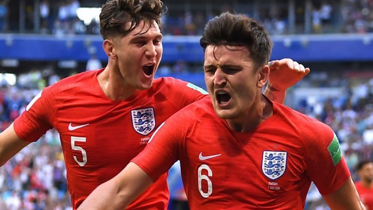 Harry Maguire and John Stones celebrate England&#039;s first goal.