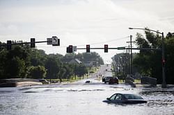 Longtime Iowa sportscaster killed as rain swamps Des Moines