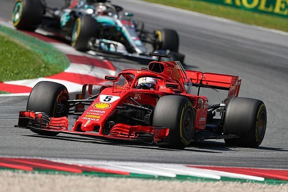 Sebastian Vettel of Germany  and  Scuderia Ferrari on track...