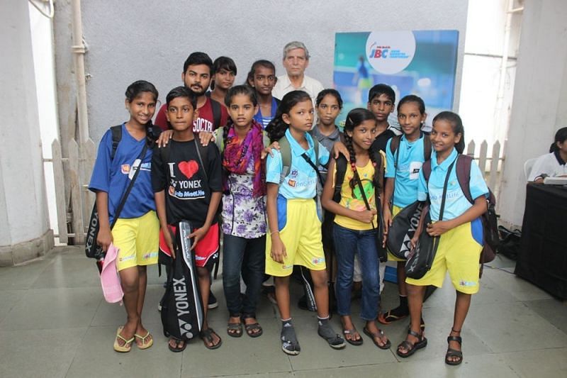 Former senior badminton player and currently a coach, Anil Pradhan with underprivileged kids who got an opportunity through PNB MetLife Junior Badminton Championship to showcase their mettle in the sport