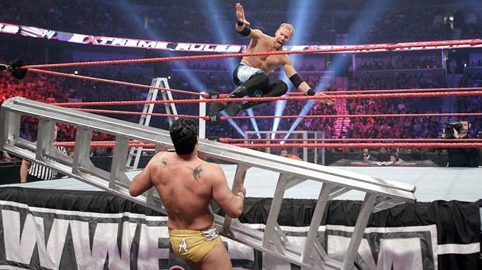 Christian launched a dropkick at Del Rio from inside the ring
