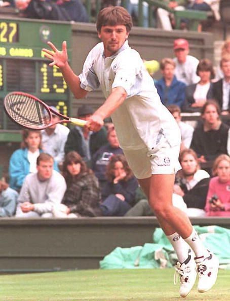 Croatian Goran Ivanisevic returns a shot to his US