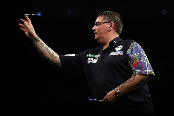 Gary Anderson wins Darts World Matchplay title to seal triple crown