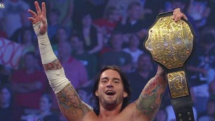 CM Punk held up the Championship after winning it via cash-in from Jeff Hardy