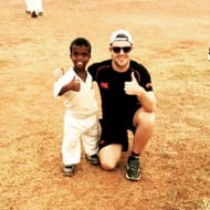 Image may contain: 2 people, including Blake Coburn, people smiling, baseball and outdoor