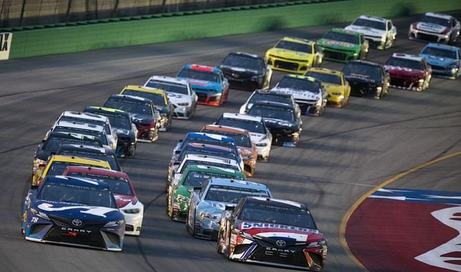 The Latest: Truex repeats at NASCAR Cup race in Kentucky