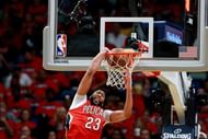 Anthony Davis pushes an alley hoop in