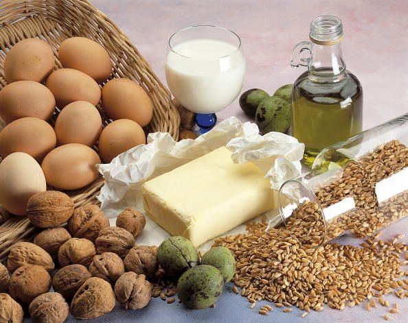 Close-up of walnuts and eggs with butter