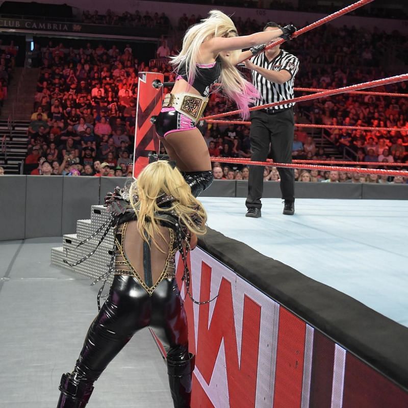 Natalya comes to the aid of Jax..