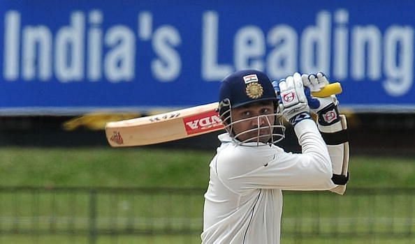 Indian cricketer Virender Sehwag plays a