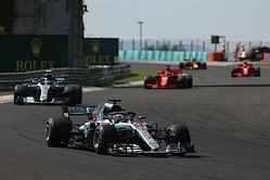Hamilton wins in Hungary to build championship lead