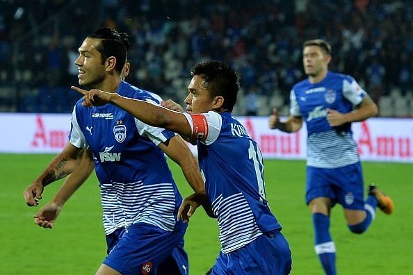 Sunil Chhetri (C) celebrates a goal with his teammates