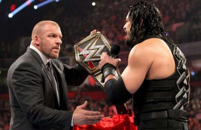 Image result for wwe roman reigns and triple h offer