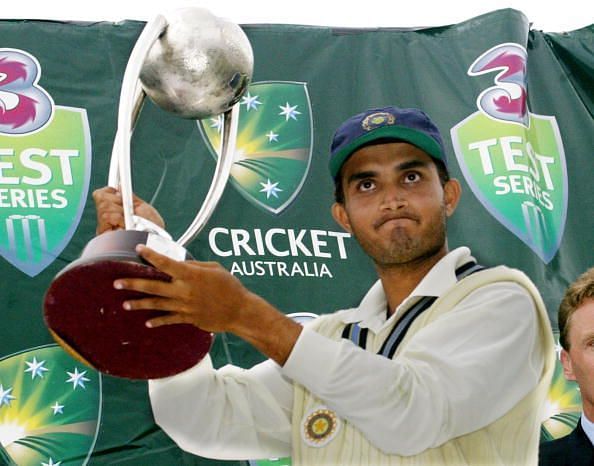 Indian captain Sourav Ganguly (R) holds 