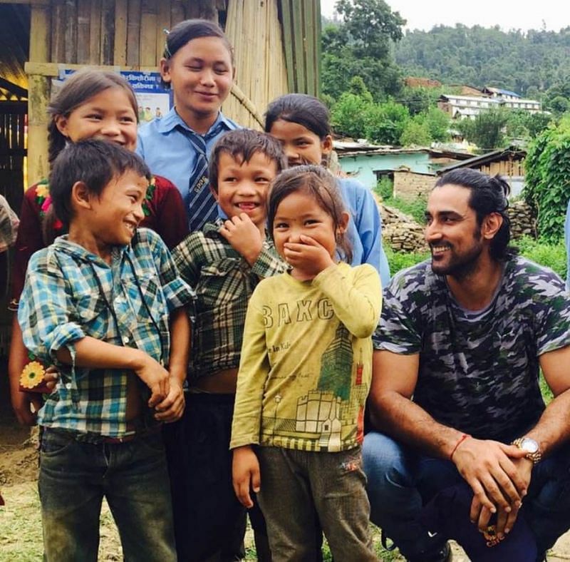 Kunal has a fun time interacting with children in Nepal