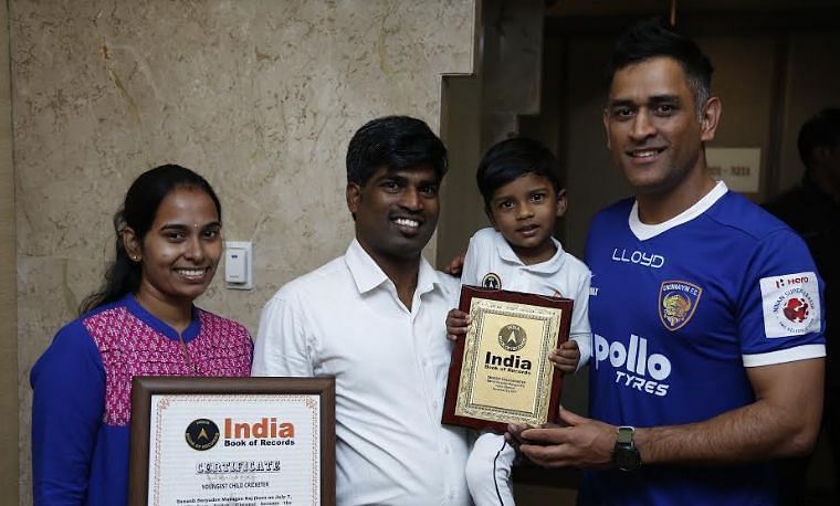 Sanush with his parents and idol MS Dhoni when he won the youngest cricketer in India award 