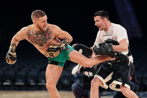 Conor McGregor (left) training with Owen Roddy 