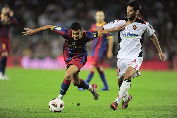 Marti Crespi battling for the ball against Pedro Rodriguez