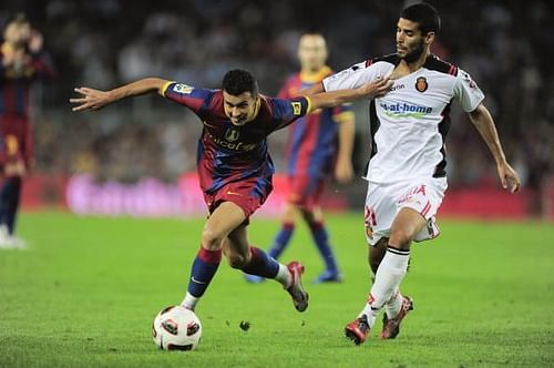 Marti Crespi battling for the ball against Pedro Rodriguez