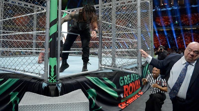The Beast&#039;s advocate, Paul Heyman, literally closes the door on Reigns&#039; opportunity to exit the cage.
