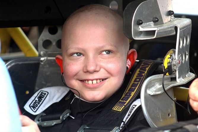 Racing stickers pour in for casket of Iowa boy with cancer