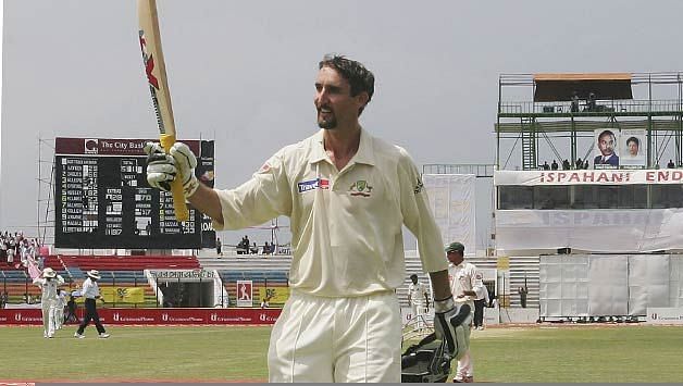 Jason Gillespie raises his bat after his double-ton &Atilde;&Acirc;&copy; Getty Images